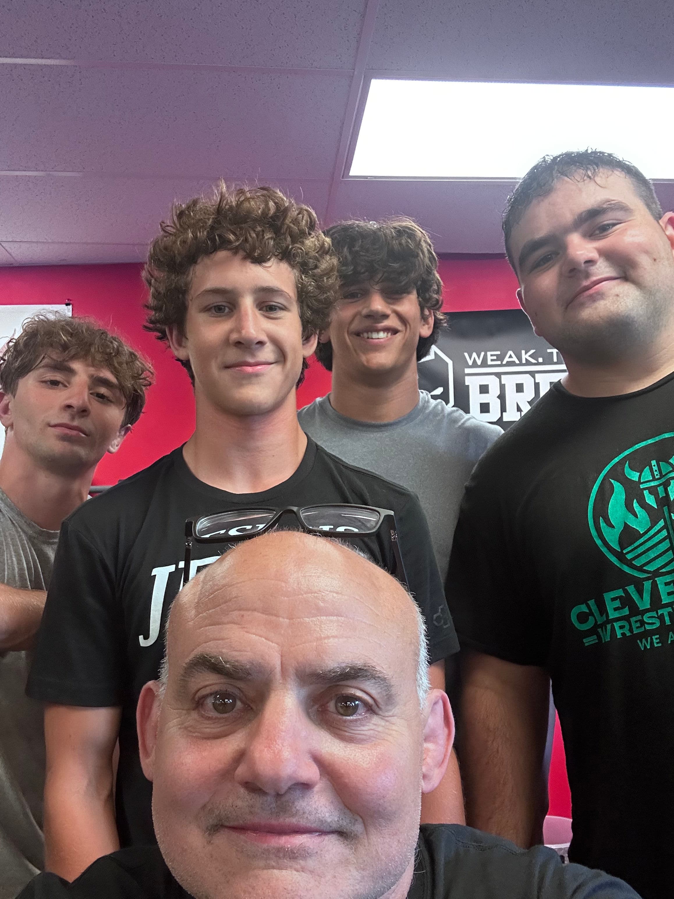 Vic with a group of athletes at the gym